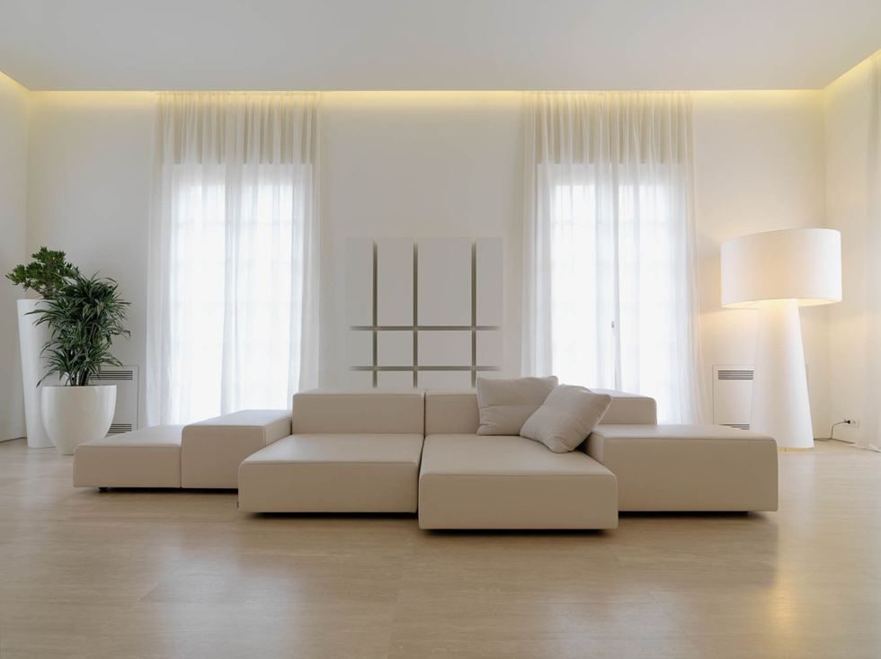 Sheer curtains against a minimal living space